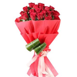 20 Pcs Thai Red Roses with color Tissue in a bouquet. Roses are imported from Thailand