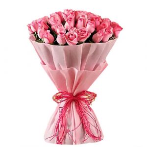 32 Pcs Thai Pink Roses with color Tissue in a bouquet. Roses are imported from Thailand