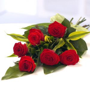 6 Pcs Thai Red Roses bouquet . Roses are imported from Thailand.